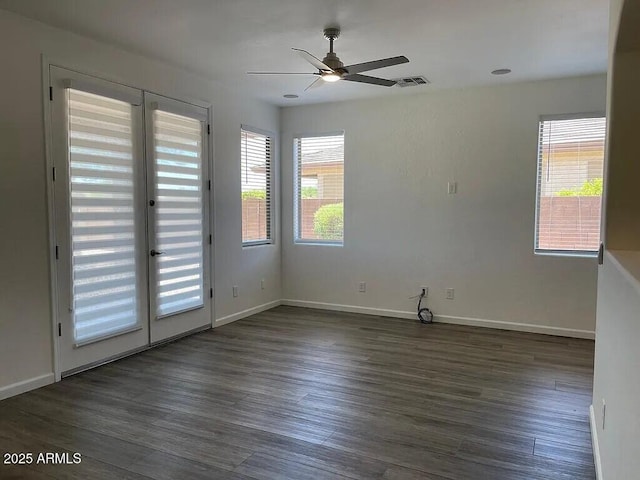 6557 S Classic Way, Gilbert, AZ 85298 - empty room featuring ceiling fan, dark wood finished floors, and baseboards