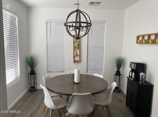 6557 S Classic Way, Gilbert, AZ 85298 - dining space featuring a chandelier, wood finished floors, and baseboards