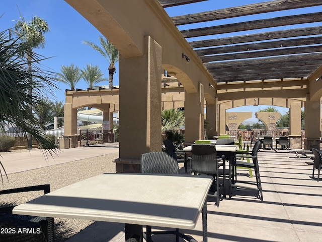 6557 S Classic Way, Gilbert, AZ 85298 - view of patio featuring outdoor dining area and a pergola