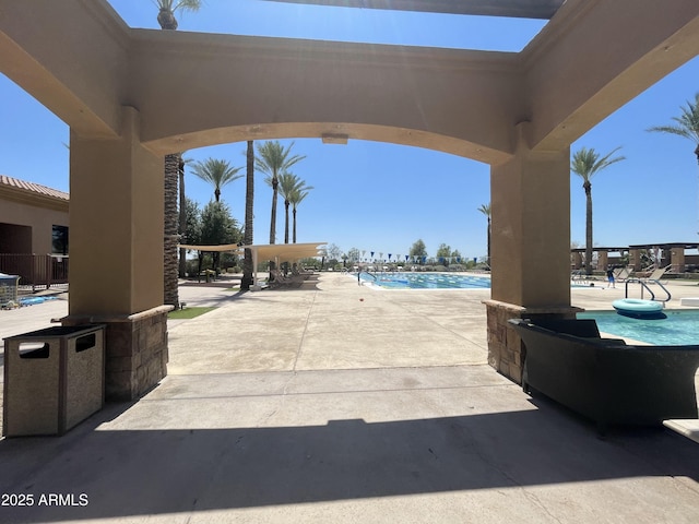 6557 S Classic Way, Gilbert, AZ 85298 - view of patio featuring a community pool