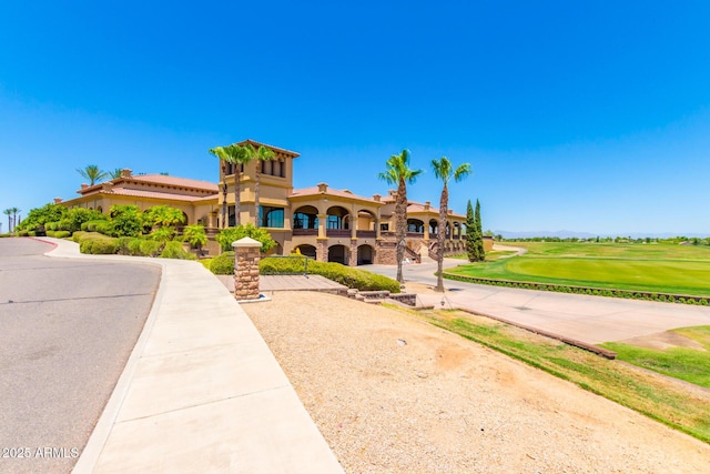 6557 S Classic Way, Gilbert, AZ 85298 - mediterranean / spanish home featuring stucco siding and golf course view