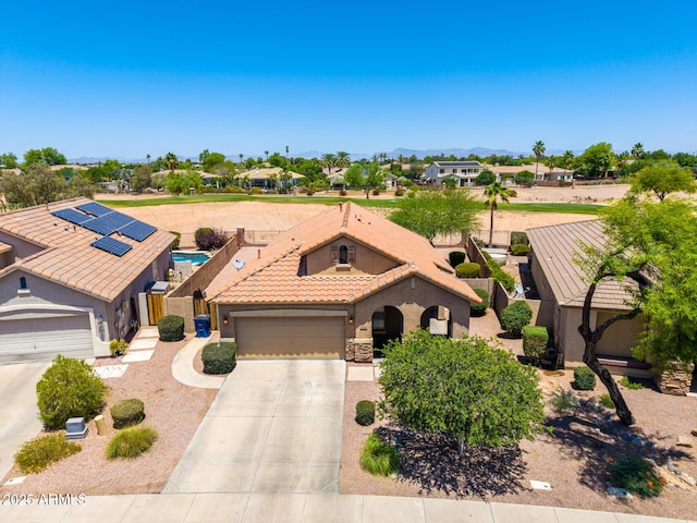 6557 S Classic Way, Gilbert, AZ 85298 - mediterranean / spanish-style home with a garage, driveway, a tile roof, stucco siding, and a residential view