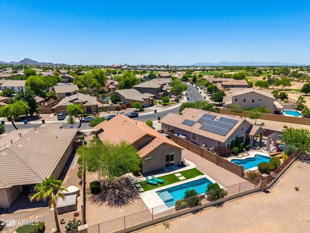 6557 S Classic Way, Gilbert, AZ 85298 - aerial view of residential area featuring a pool and a mountainous background