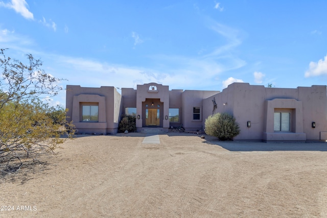 view of adobe home