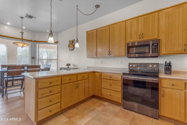 kitchen with kitchen peninsula, hanging light fixtures, stainless steel appliances, light tile patterned floors, and light brown cabinetry