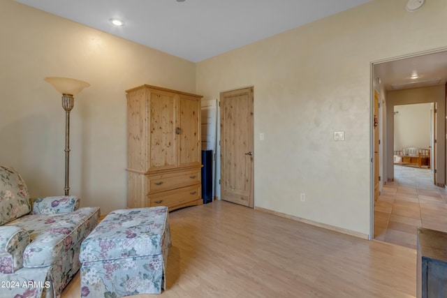 sitting room with light wood-type flooring