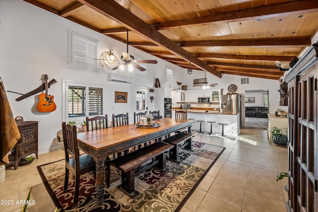 tiled dining area featuring beamed ceiling, ceiling fan, and wooden ceiling