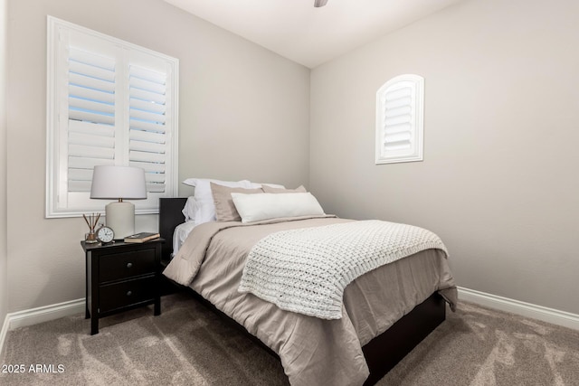 carpeted bedroom with baseboards