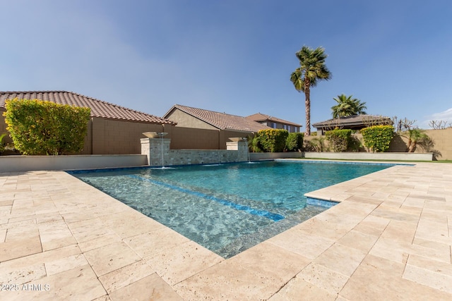 view of pool with a fenced in pool, a patio area, and a fenced backyard