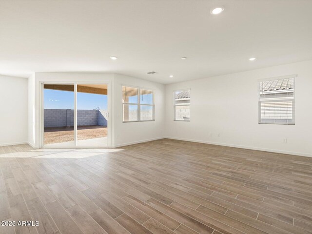 empty room featuring light hardwood / wood-style floors