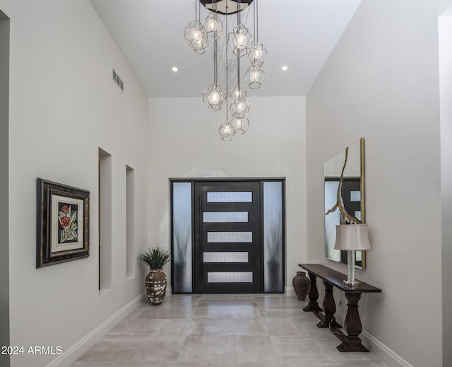 foyer featuring a high ceiling