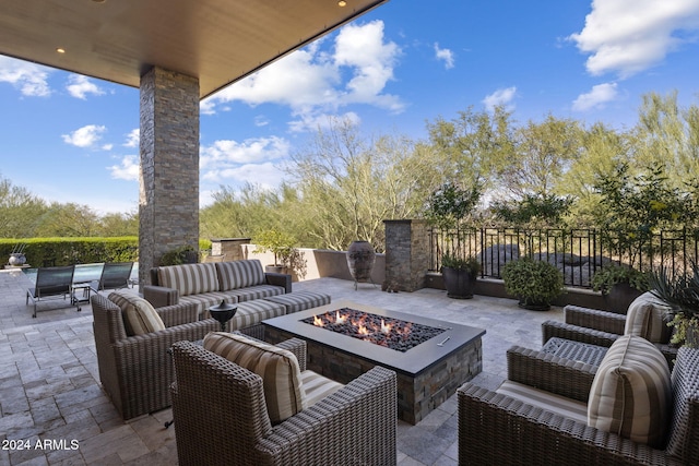 view of patio / terrace with a fire pit