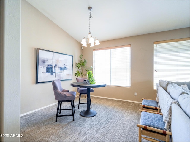 22986 S 208th St, Queen Creek, AZ 85142 - carpeted dining room featuring a chandelier, baseboards, and vaulted ceiling