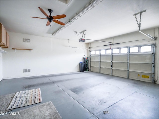 22986 S 208th St, Queen Creek, AZ 85142 - garage with a garage door opener and a ceiling fan