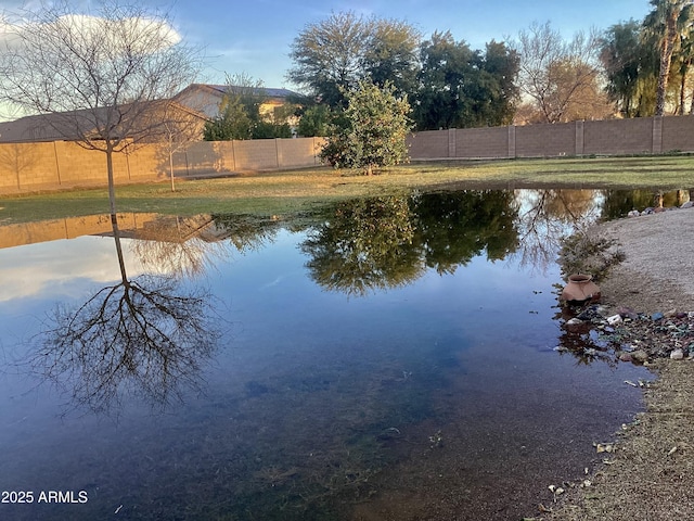 view of water feature featuring fence