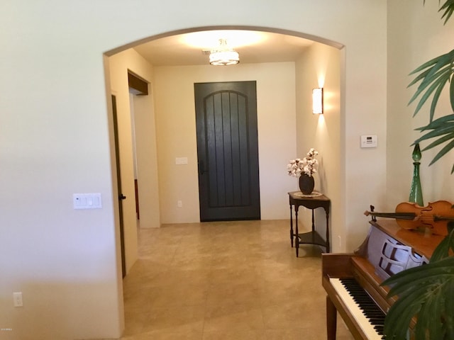 foyer with arched walkways