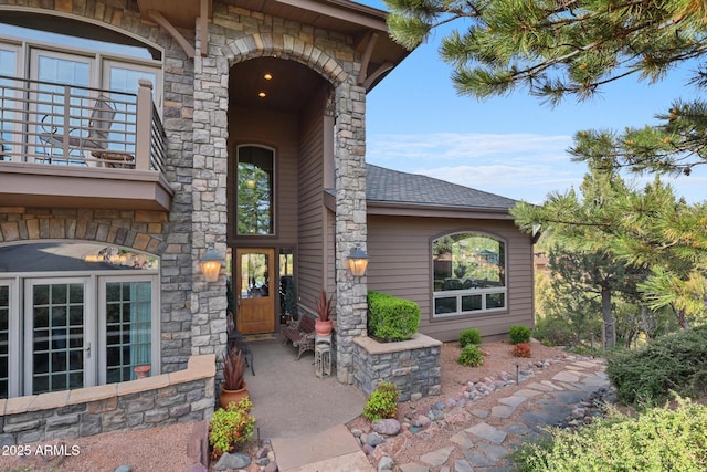 2800 E Morning Glory Cir, Payson, AZ 85541 - doorway to property featuring stone siding, a balcony, and roof with shingles