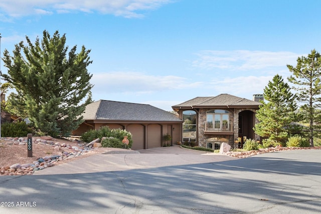 2800 E Morning Glory Cir, Payson, AZ 85541 - view of front of property with an attached garage, driveway, and stone siding