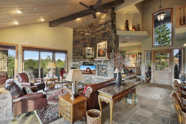 2800 E Morning Glory Cir, Payson, AZ 85541 - living room featuring high vaulted ceiling, a ceiling fan, a fireplace, stone finish flooring, and wooden ceiling