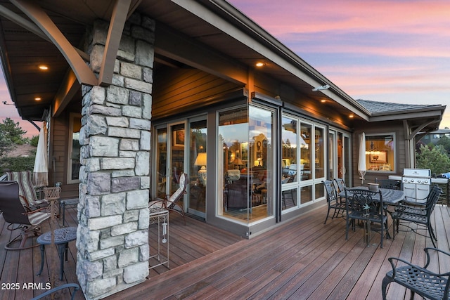 2800 E Morning Glory Cir, Payson, AZ 85541 - deck at dusk with outdoor dining space and area for grilling