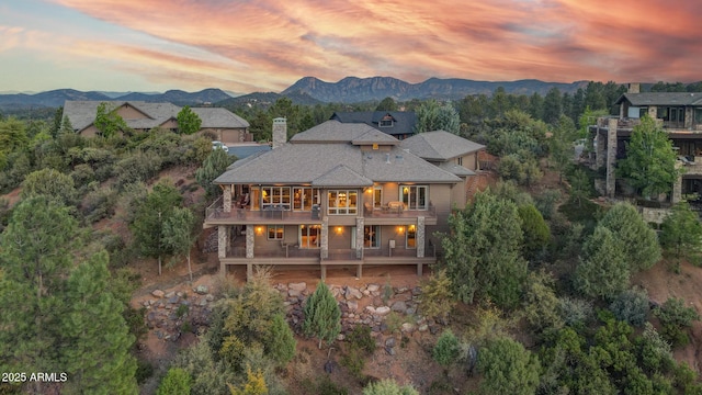 2800 E Morning Glory Cir, Payson, AZ 85541 - back of house featuring a balcony, a chimney, and a mountain view