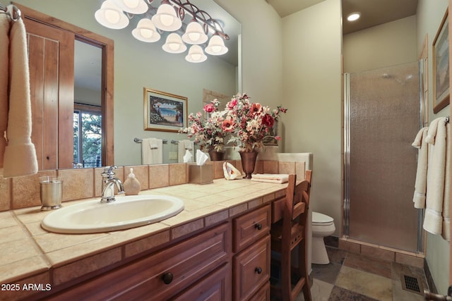 2800 E Morning Glory Cir, Payson, AZ 85541 - bathroom with toilet, vanity, a shower stall, stone finish floors, and recessed lighting