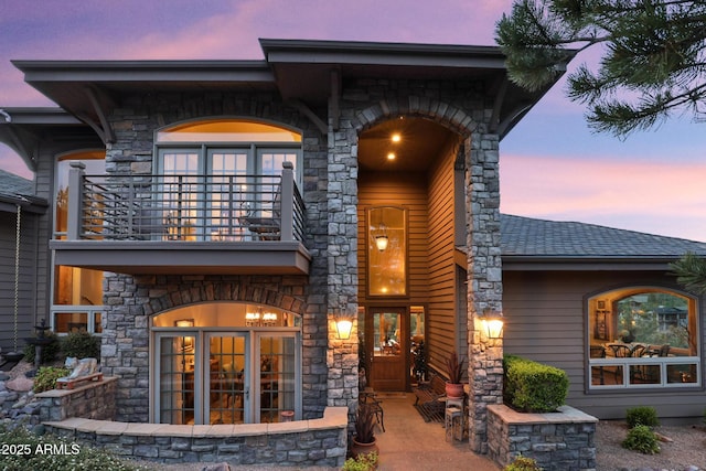 2800 E Morning Glory Cir, Payson, AZ 85541 - doorway to property with a balcony, stone siding, and roof with shingles