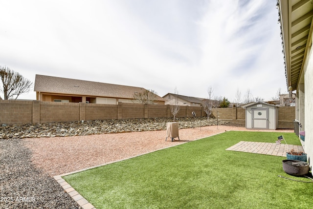 6215 E Sefton Dr, Prescott Valley, AZ 86314 - view of yard with an outbuilding, a storage unit, a fenced backyard, and a patio area