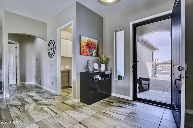 6215 E Sefton Dr, Prescott Valley, AZ 86314 - foyer featuring baseboards and arched walkways