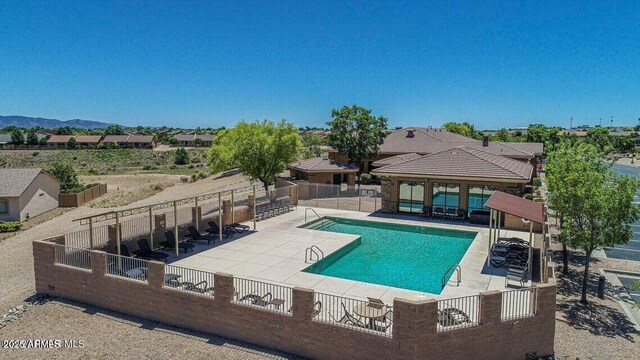 6215 E Sefton Dr, Prescott Valley, AZ 86314 - community pool featuring a patio and fence