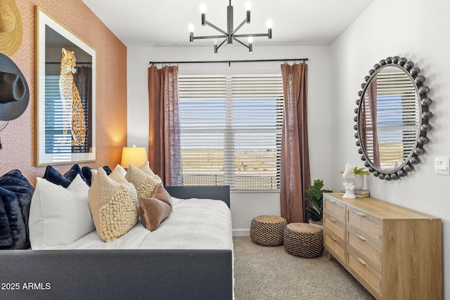 carpeted bedroom featuring a chandelier