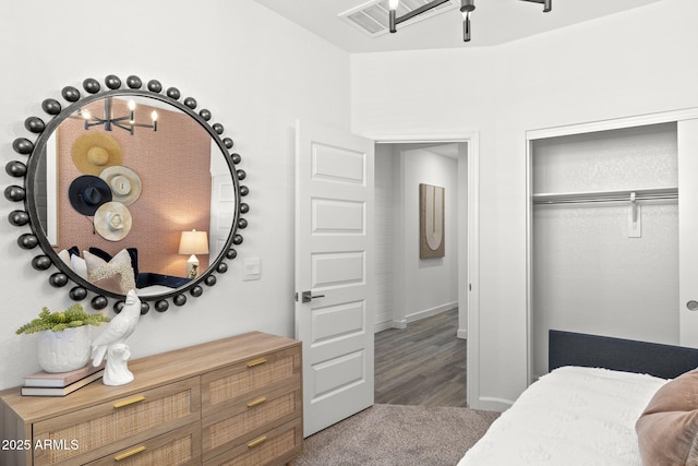 carpeted bedroom featuring a closet