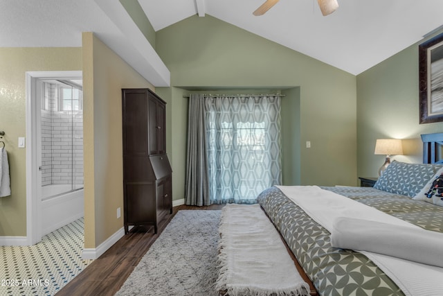 bedroom with a ceiling fan, dark wood-style flooring, baseboards, vaulted ceiling with beams, and ensuite bath