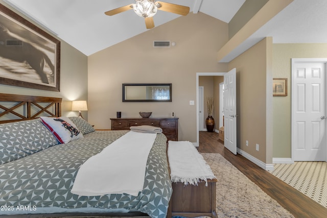 bedroom featuring visible vents, wood finished floors, baseboards, ceiling fan, and high vaulted ceiling