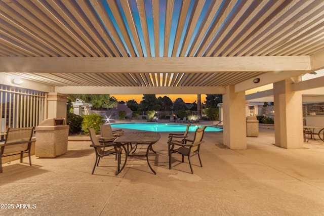 community pool with a patio
