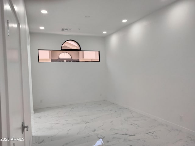 25150 N Windy Walk Dr Unit 14, Scottsdale, AZ 85255 - unfurnished room with recessed lighting and marble look tiles