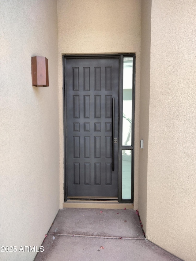 25150 N Windy Walk Dr Unit 14, Scottsdale, AZ 85255 - view of exterior entry with stucco siding