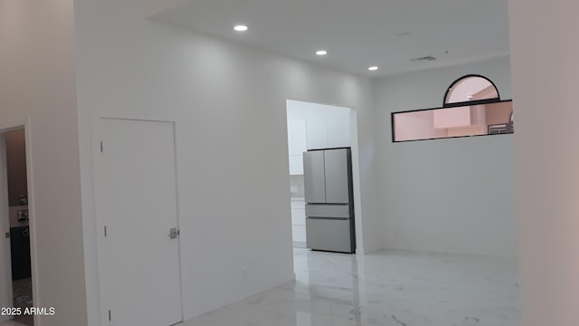 25150 N Windy Walk Dr Unit 14, Scottsdale, AZ 85255 - corridor with light marble finish flooring and recessed lighting
