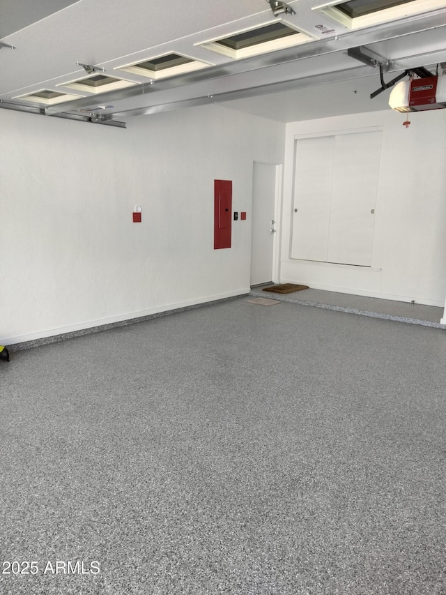 25150 N Windy Walk Dr Unit 14, Scottsdale, AZ 85255 - garage with a garage door opener and electric panel