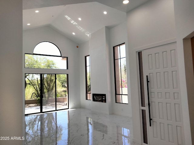 25150 N Windy Walk Dr Unit 14, Scottsdale, AZ 85255 - entrance foyer with high vaulted ceiling, marble tiled floors, and recessed lighting