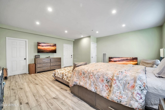 bedroom with light hardwood / wood-style flooring