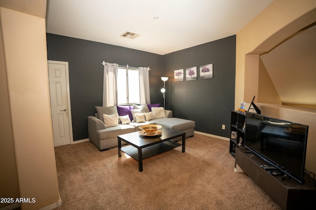 living room with light colored carpet, visible vents, and baseboards