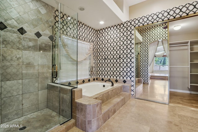 12183 E Mercer Ln, Scottsdale, AZ 85259 - full bath featuring a garden tub, a stall shower, and baseboards
