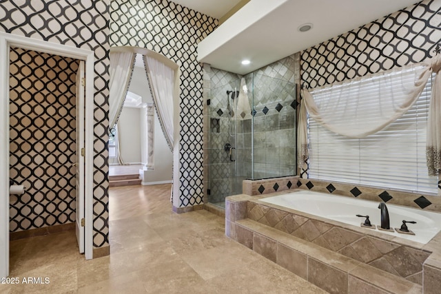 12183 E Mercer Ln, Scottsdale, AZ 85259 - bathroom with a garden tub, tiled shower, baseboards, and wallpapered walls