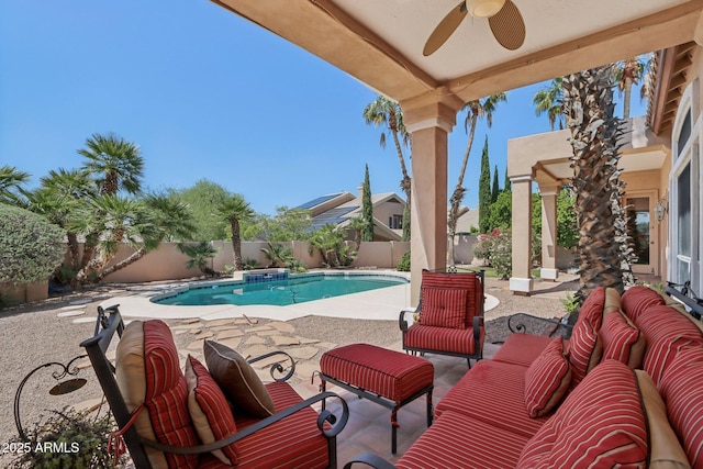 12183 E Mercer Ln, Scottsdale, AZ 85259 - view of swimming pool featuring a ceiling fan, a patio area, a fenced backyard, and an outdoor hangout area