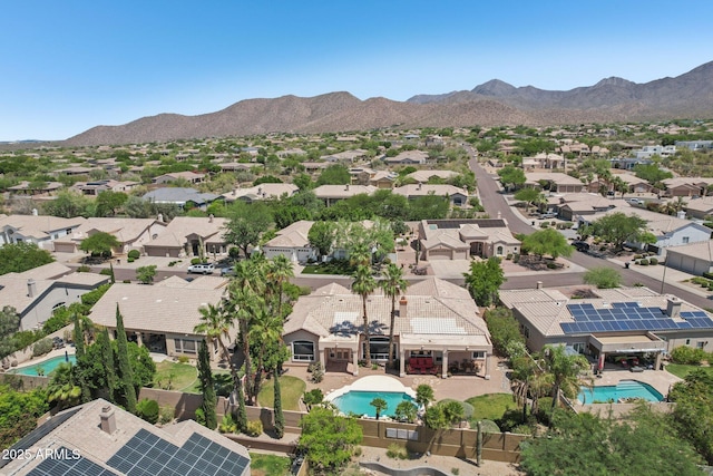 12183 E Mercer Ln, Scottsdale, AZ 85259 - aerial perspective of suburban area with a pool area and a mountain backdrop