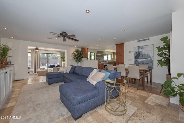 living room featuring ceiling fan