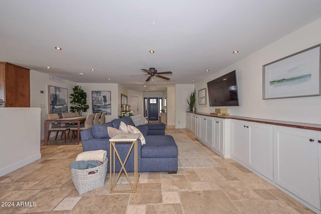 living room featuring ceiling fan