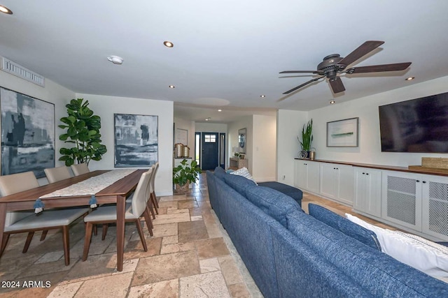 living room featuring ceiling fan