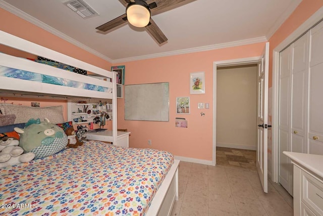 bedroom featuring a closet, ceiling fan, and crown molding